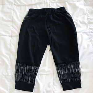 Fashion Nova BLK joggers W/ netting design.